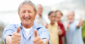 Man giving thumbs up sign