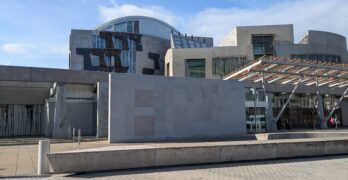 A picture of the Scottish parliament building on a sunny day