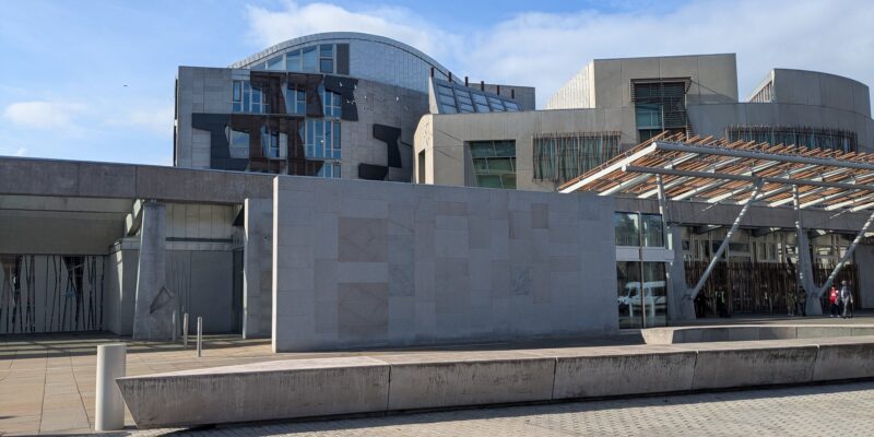 A picture of the Scottish parliament building on a sunny day