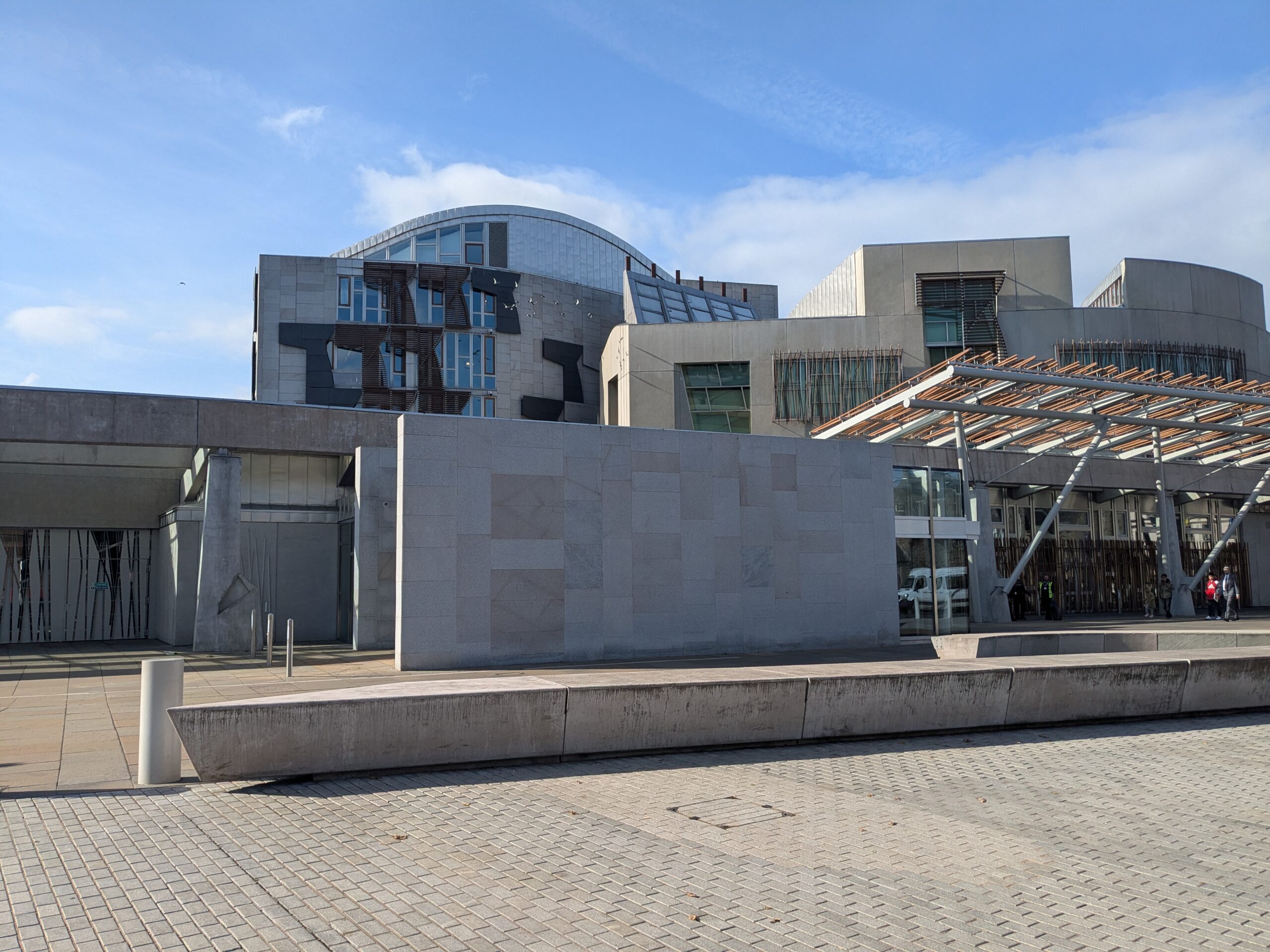 A picture of the Scottish parliament building on a sunny day